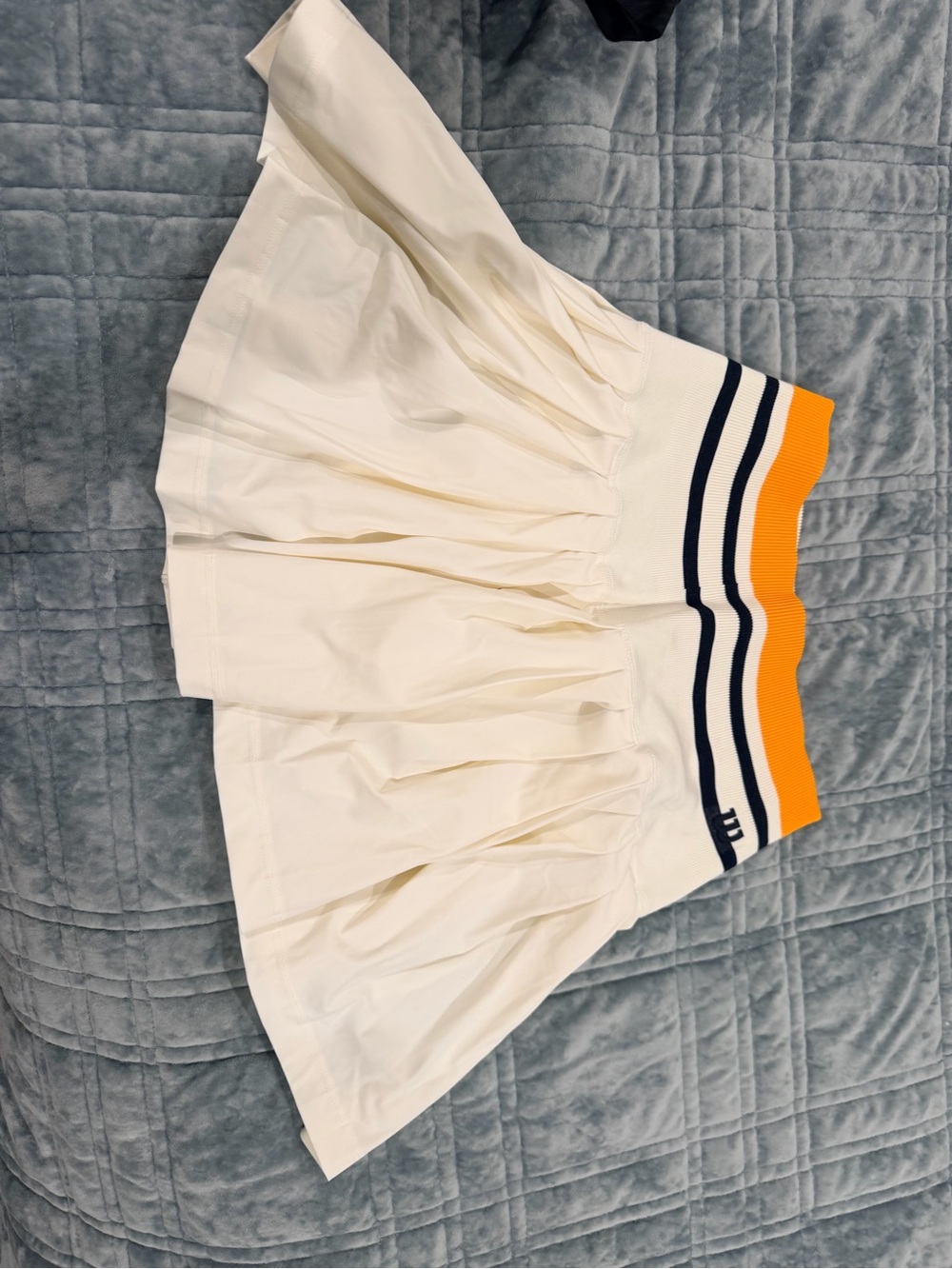 Wilson Pleated Cream Tennis Skirt with Navy & Orange Waistband - size XS